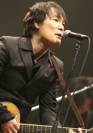 黒沢健一